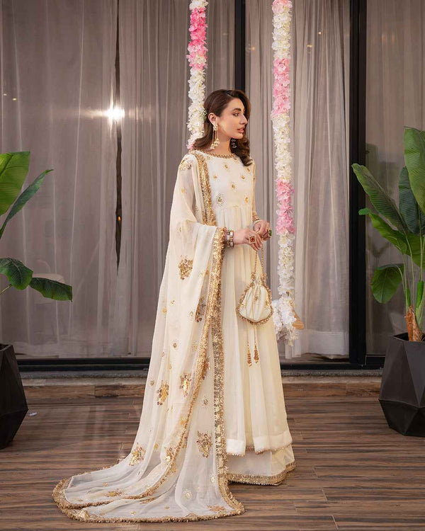 Elegant Off-White Embroidered Suit with Gold Festive