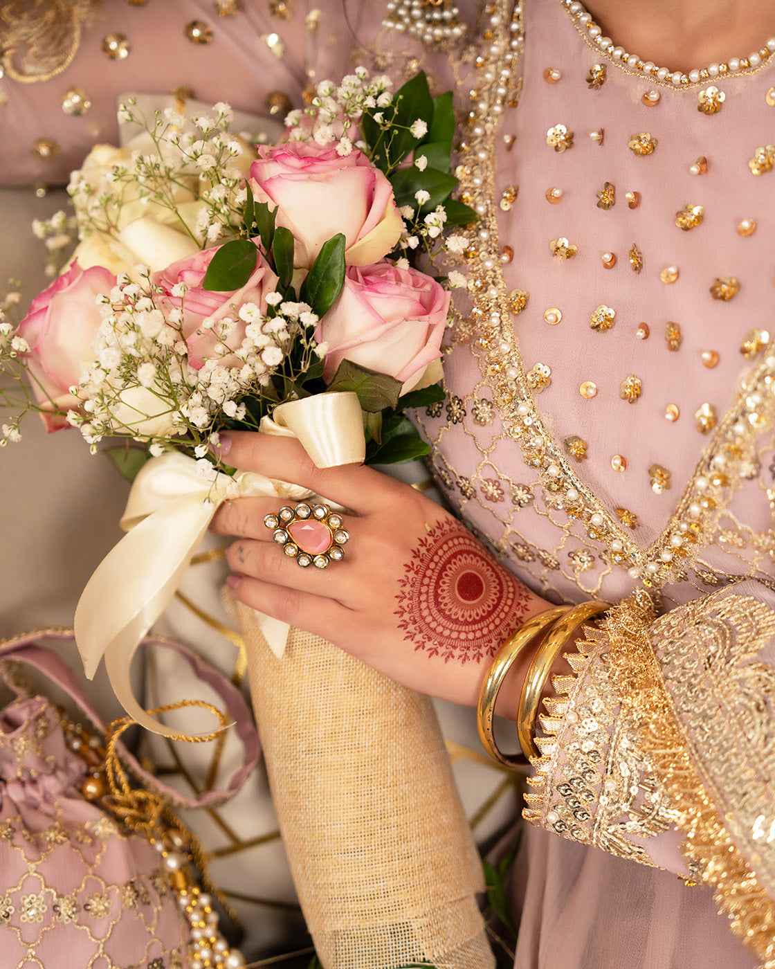 Dusty Pink Suit with Gold Detailing & Matching Potli