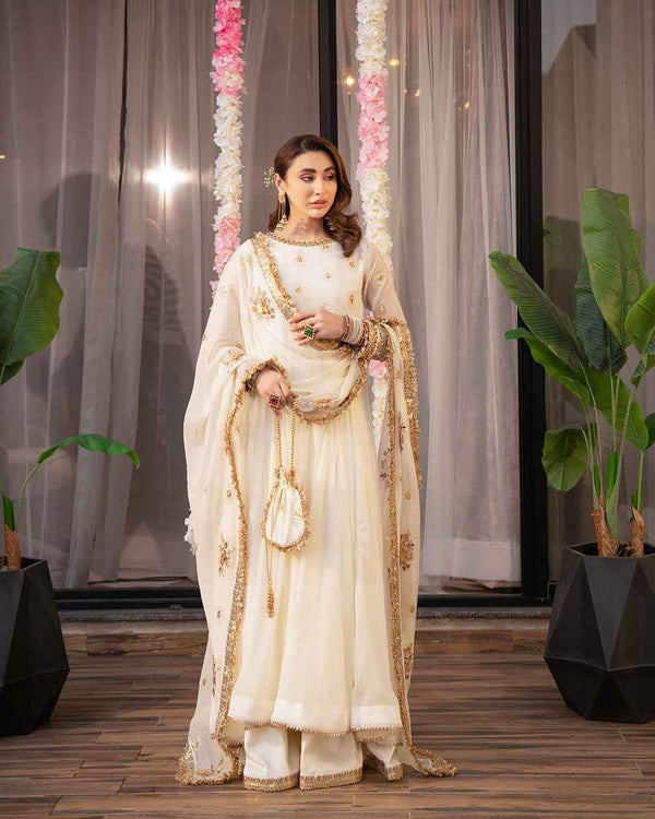 Elegant Off-White Embroidered Suit with Gold Festive