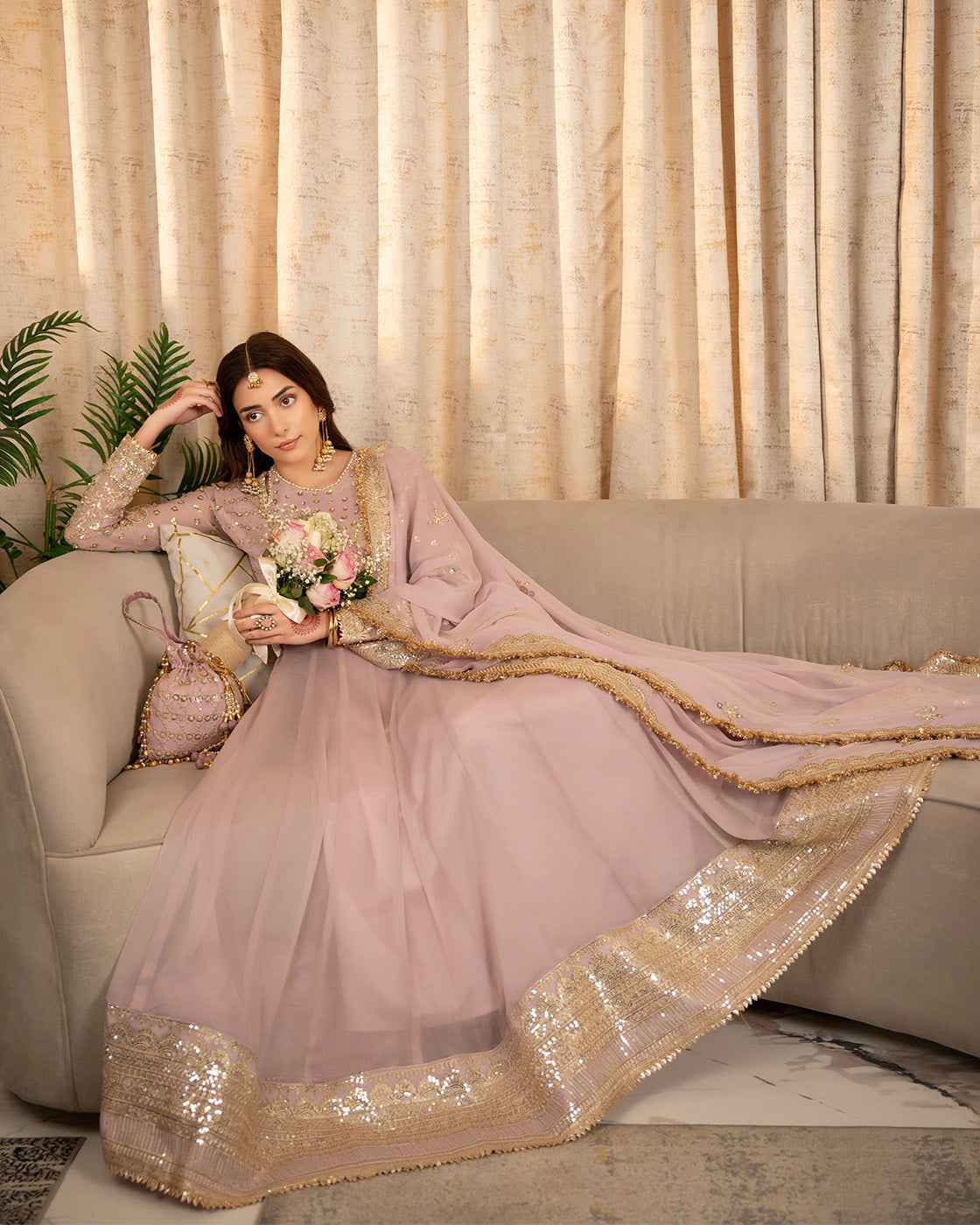 Dusty Pink Suit with Gold Detailing & Matching Potli