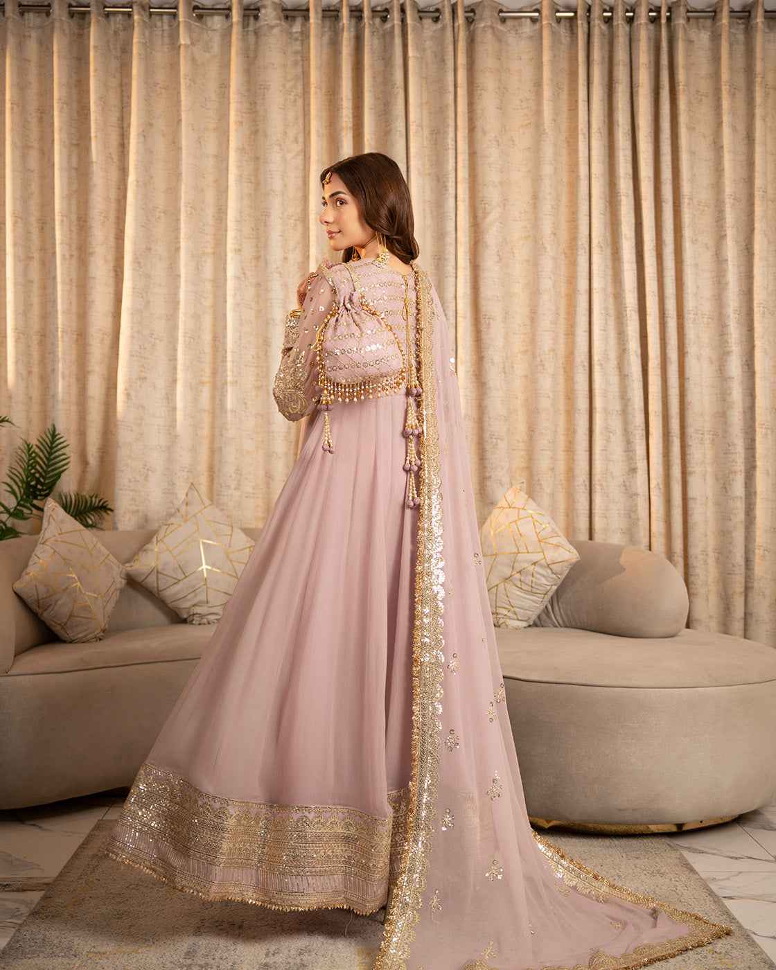 Dusty Pink Suit with Gold Detailing & Matching Potli