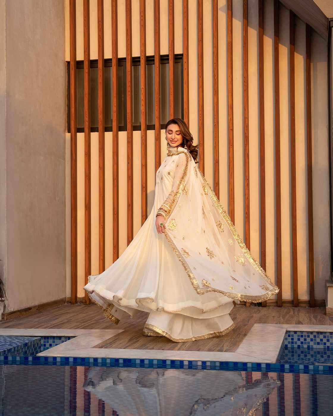 Elegant Off-White Embroidered Suit with Gold Festive