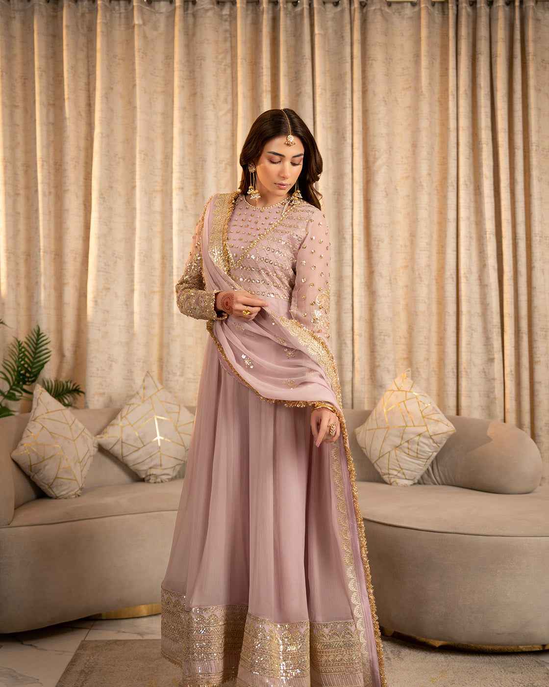 Dusty Pink Suit with Gold Detailing & Matching Potli
