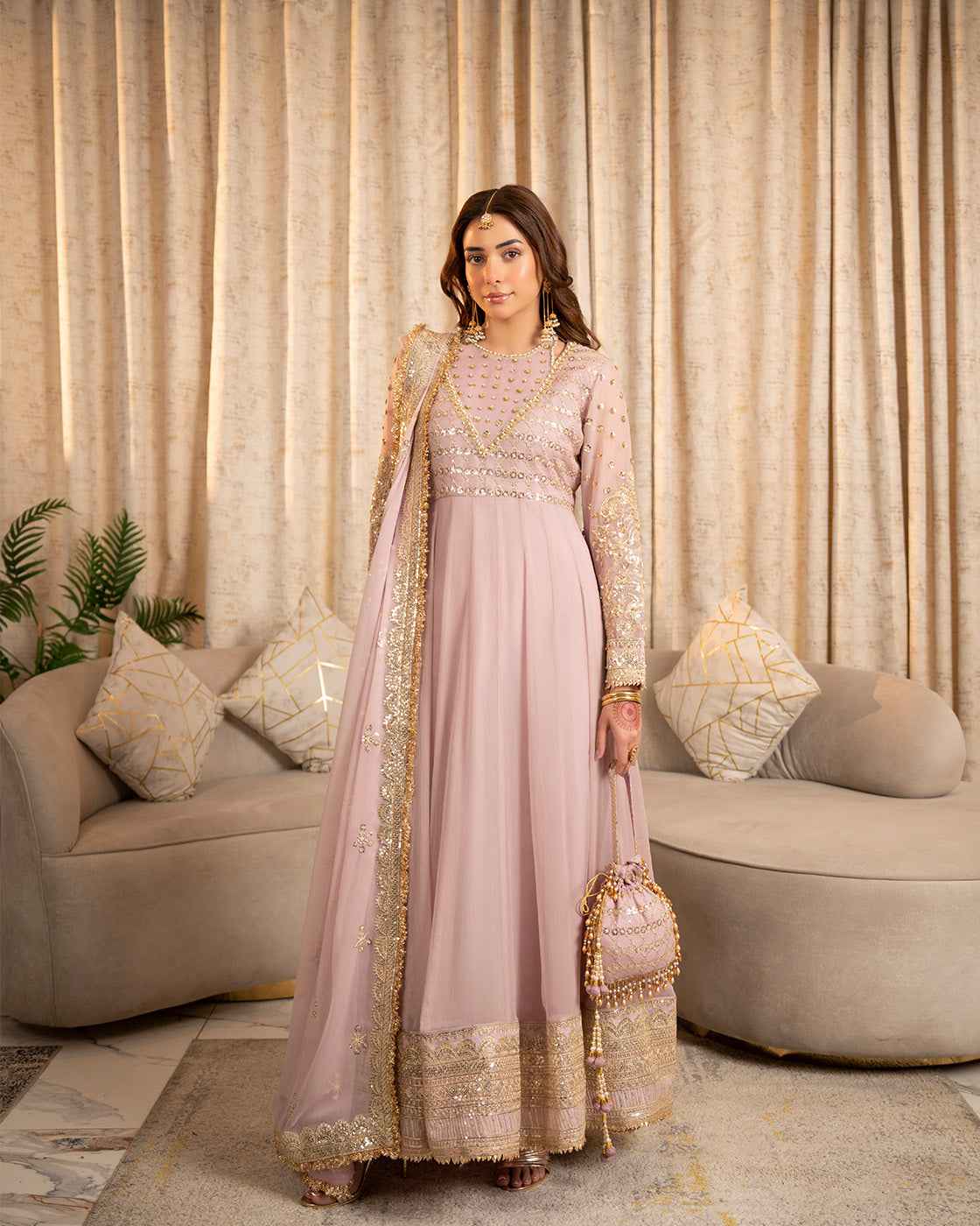 Dusty Pink Suit with Gold Detailing & Matching Potli